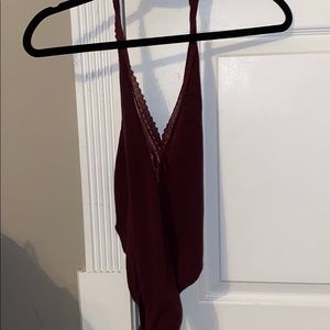 Plum colored halter bodysuit